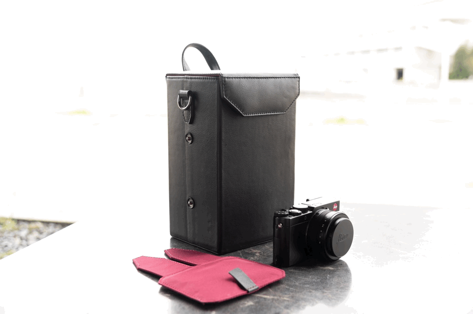 シティカメラショルダーバッグ | 防水本革 縦型 カメラ保護 ユニセックス